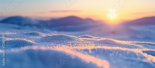 Tranquil Winter Sunset SnowCovered Hills Bask in Last Lights Warm Glow photo