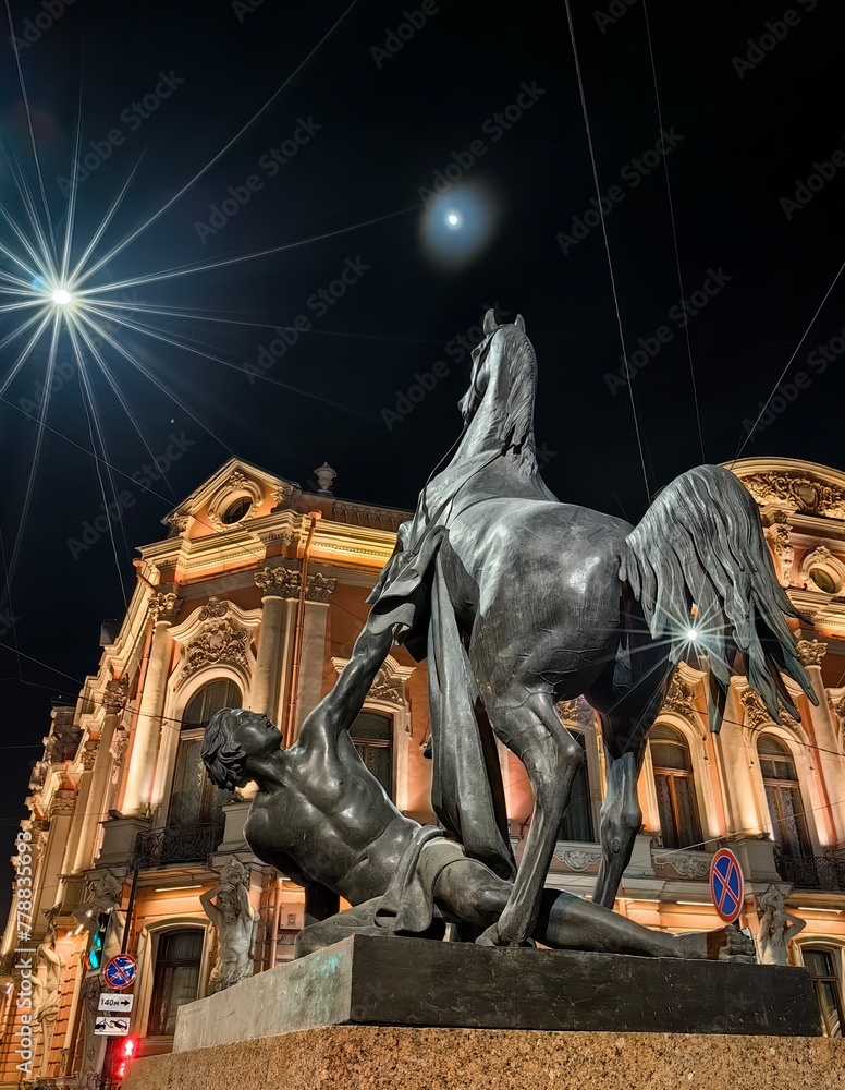 Statue of a horse on the famous Anichkov Bridge in St. Petersburg, Russia