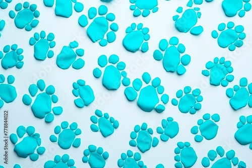 Cyan paw prints on a background, minimalist backdrop pattern with copy space for design or photo, animal pet cute surface 