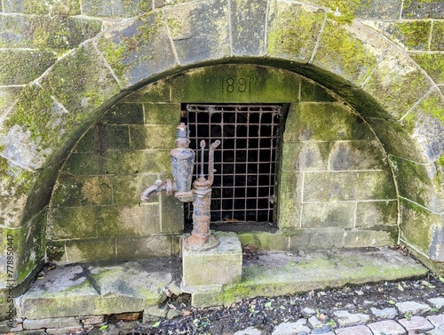 Old water pump in a village 