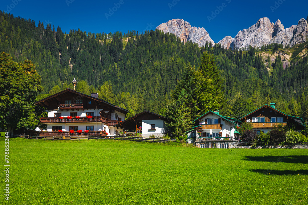 Alpine village with cute houses in the Alps, Austria