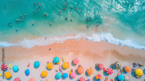 top view of turquoise water and beach with umbrellas