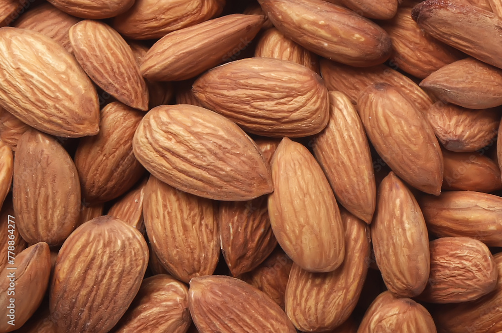 Close up of almond nuts background. Healthy food concept. Close up of almond nuts background. Healthy food concept.