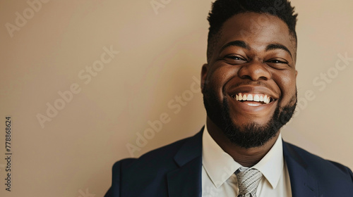 Young and happy african american business man wearing a classic suit 