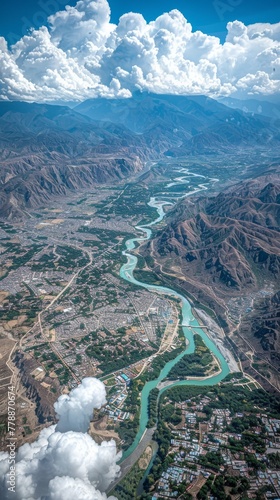 Aerial View of River Flowing Through Valley