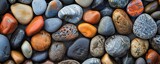 High-resolution image showcasing a variety of smooth, colorful stones closely packed together