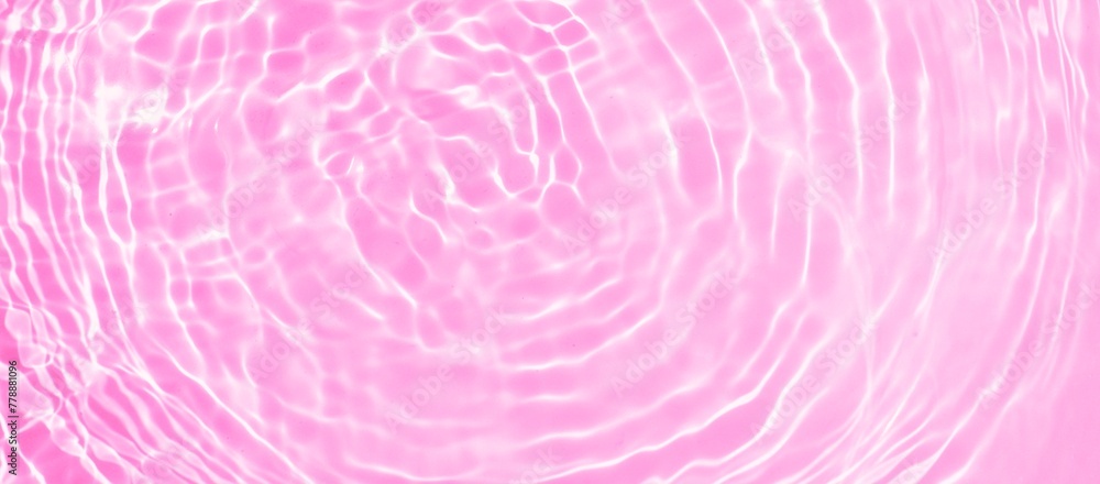 Pink water wave texture background. Reflection of Sunlight in pink water surface with ripples and splashes. Natural summer vacation banner. Beauty background for skin care cosmetics advertisement Pink water wave texture background. Reflection of Sunlight in pink water surface with ripples and splashes. Natural summer vacation banner. Beauty background for skin care cosmetics advertisement
