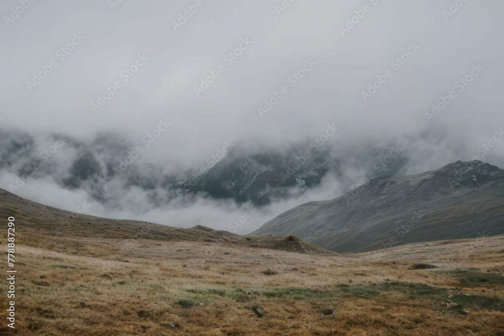 Steaming geothermal features peek through clouds in a mountainous landscape, creating a mystical scene reminiscent of Yellowstone National Park Steaming geothermal features peek through clouds in a mountainous landscape, creating a mystical scene reminiscent of Yellowstone National Park