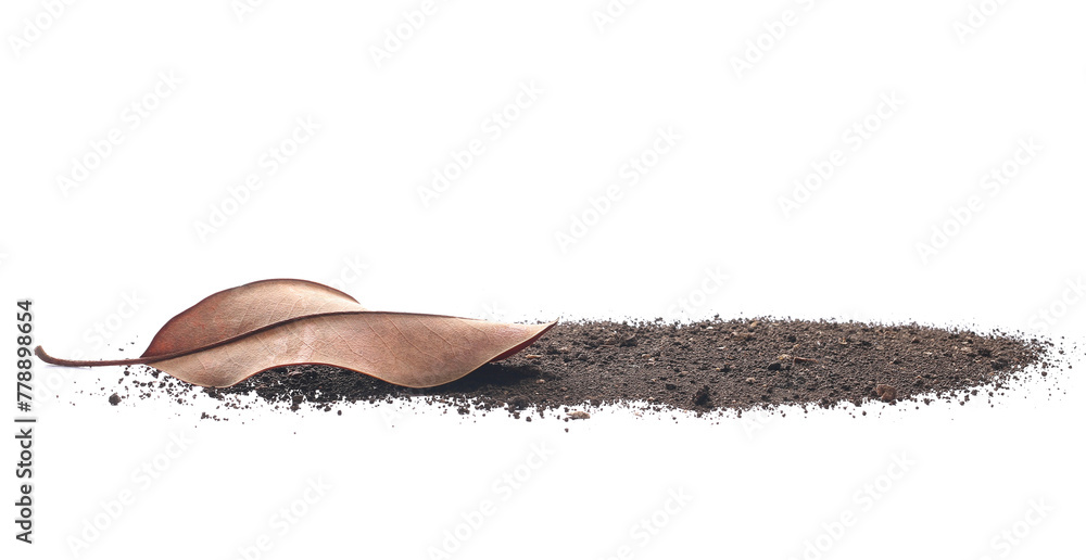 Naklejka premium Dirt pile with dry leaf isolated on white background