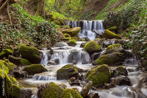 waterfalls along a mountain stream © taviphoto