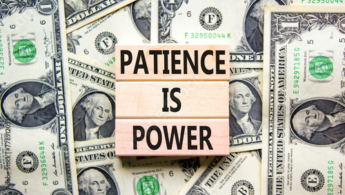 Patience is power symbol. Concept words Patience is power on beautiful wooden blocks. Dollar bills. Beautiful dollar bills background. Business and patience is power concept. Copy space.