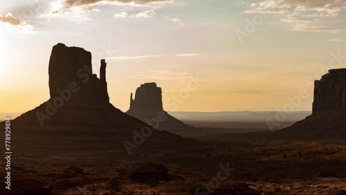 Monument Valley Desert Beyond West East Mitten and Merrick Butte Sunrise Time Lapse Arizona Southwest USA photo