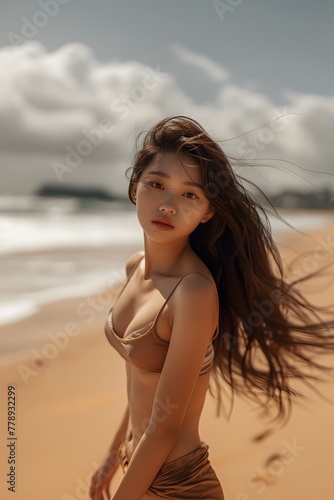 A woman in a bikini standing on a beach