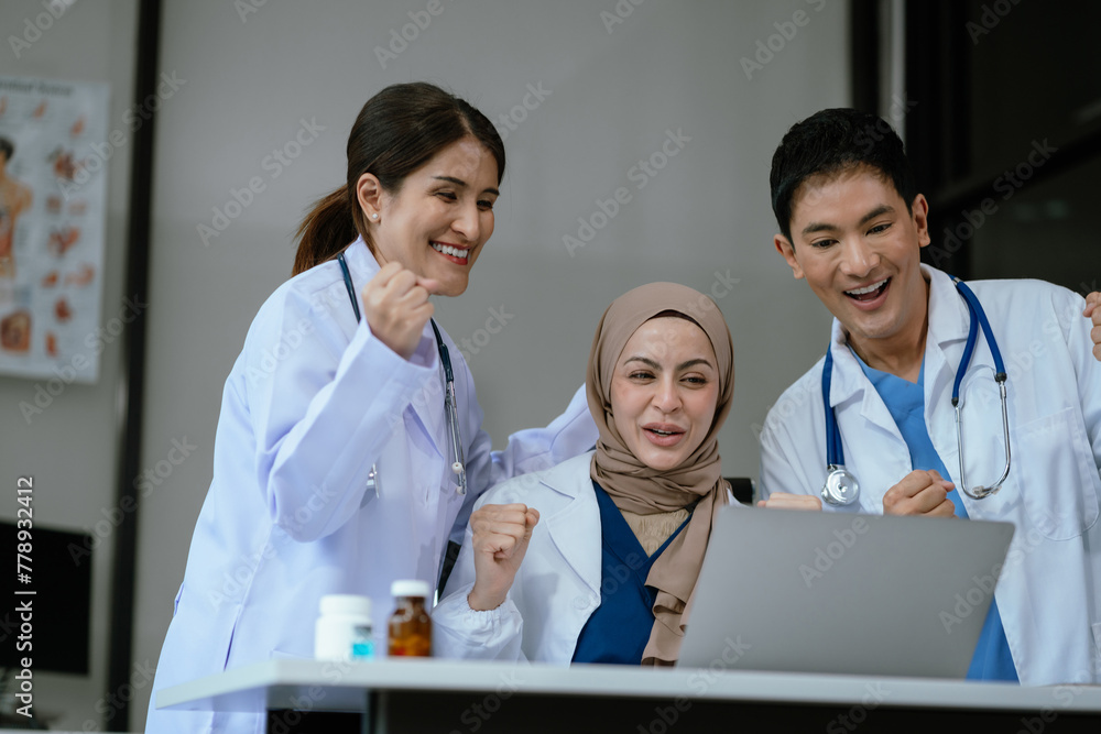 Successful medical team thumbs up to show success and motivation. Successful medical team thumbs up to show success and motivation.
