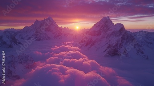   The sun descends over a mountainous landscape, adorned with clouds in the distance and a radiant pink backdrop