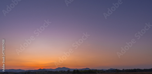 Dusk sky horizon landscape on twilight after sun down, sunset sky in summer evening countryside 