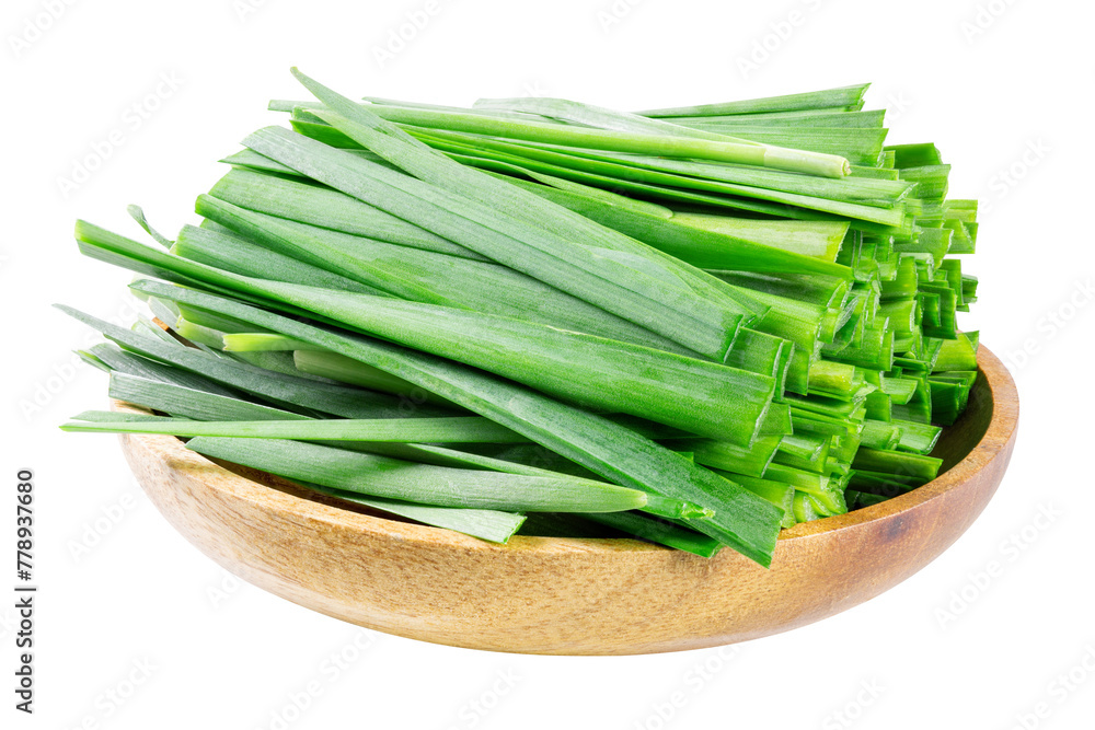Chopped fresh green chive leaves in a wooden bowl isolated on white background Chopped fresh green chive leaves in a wooden bowl isolated on white background