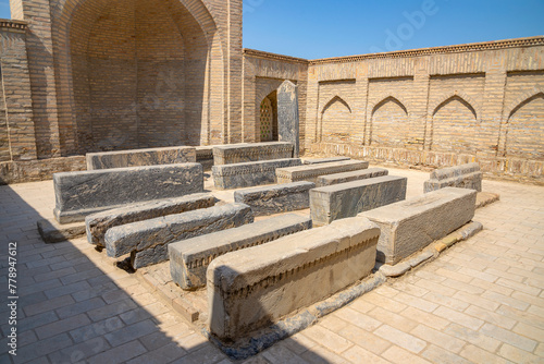 A courtyard with old graves (XVII century). The city of the dead is Chor Bakr. The surroundings of Bukhara. Sumitan, Uzbekistan