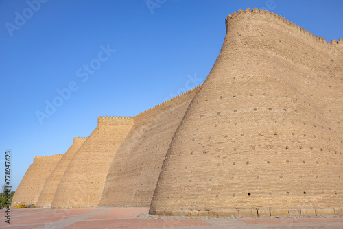 The elegant towers of the old Ark fortress. Bukhara, Uzbekistan