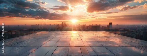 Empty square floor with city skyline background at sunset. High angle view of empty concrete platform and urban landscape with buildings in the distance. Wide panoramic banner for product display