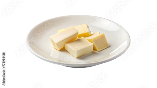 Pieces of butter on a white plate. Isolated on a transparent background.