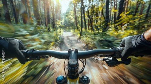 First-person view of a mountain biker speeding through a sun-dappled forest trail. POV concept photo