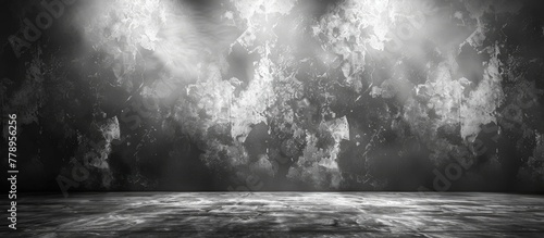 A blackandwhite photo captures the mysterious atmosphere of a dark room with smoke billowing from the ceiling, creating a cloudlike effect. The wood and asphalt textures add to the eerie ambiance photo