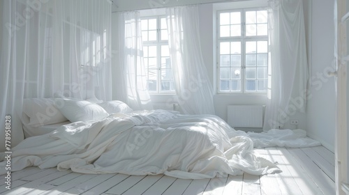 A spacious, all-white bedro...