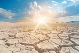 Cracked waterless ground at summer drought . Natural disasters desert background