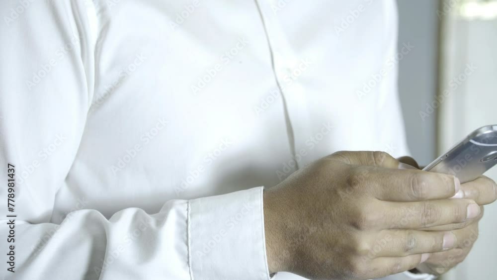 Man in White Shirt Texting on Smartphone in Bright Indoor Setting During Daytime
Man in White Shirt Texting on Smartphone in Bright Indoor Setting During Daytime