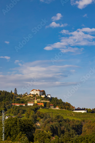 Kapfenstein castle and church with vineyard, Styria, Austria