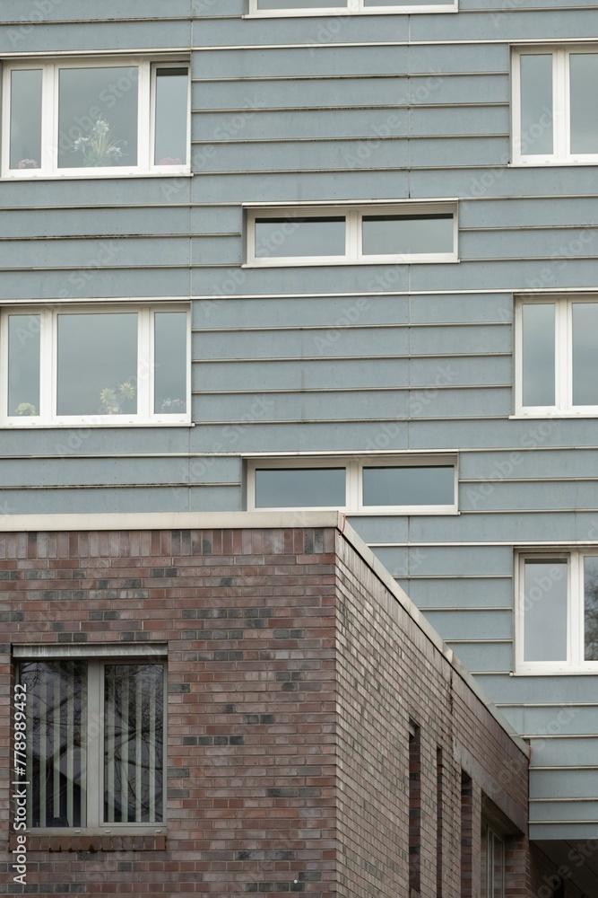 poorly maintained apartment building facade from the 70s