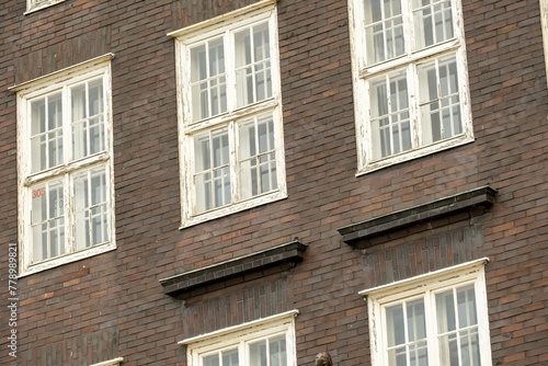 old brick building with old double windows