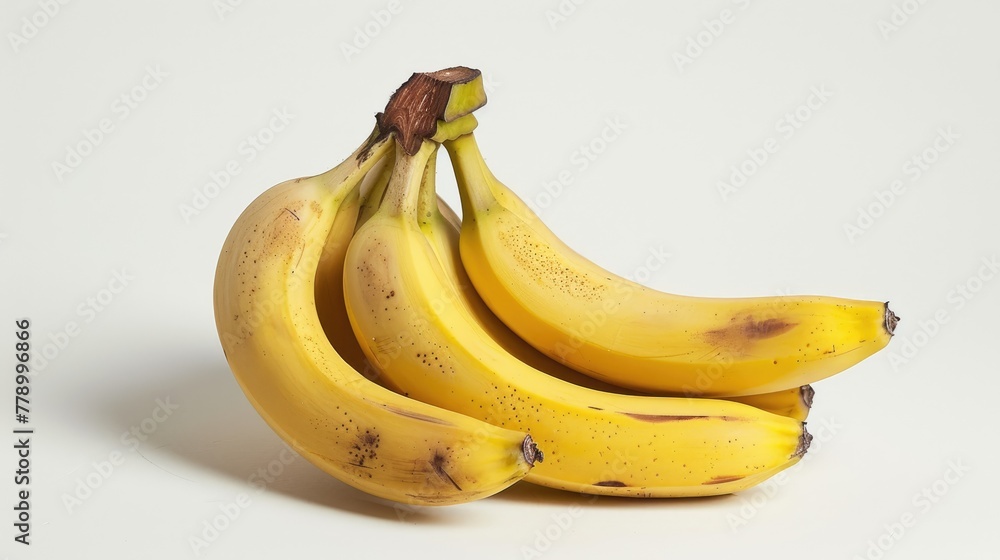 A bunch of bananas on a white background. An exotic fruit. Delicious and juicy bright yellow bananas. A bunch of bananas on a white background. An exotic fruit. Delicious and juicy bright yellow bananas.