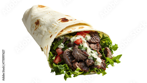 Ginni's beef shawarma with ranch dressing wrapped in soft tortilla on white background, side view photo