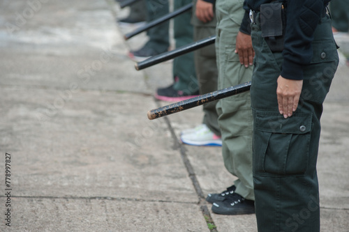 Female riot police practice using batons to control crowds.  © saksuvan