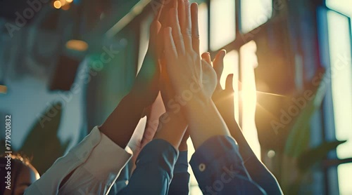business people Hands reaching against shining light background photo