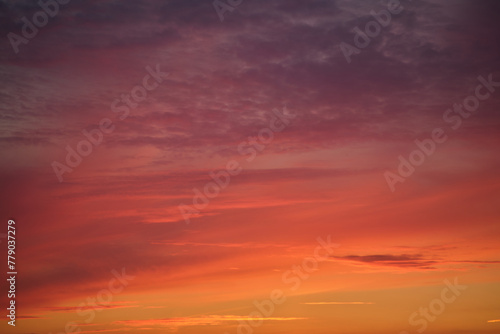 The sunset sky was filled with a mix of red and orange clouds