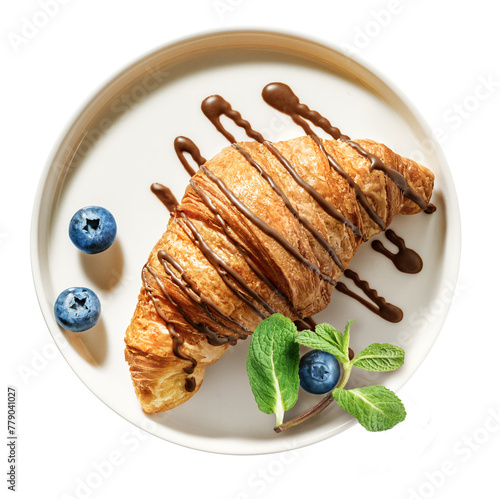 Croissant with chocolate topping and blueberry on serving plate isolated on white background directly above