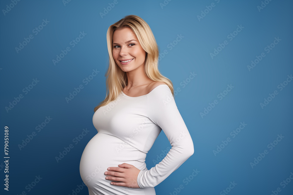 Young pretty blonde Pregnant girl over isolated colorful background Young pretty blonde Pregnant girl over isolated colorful background