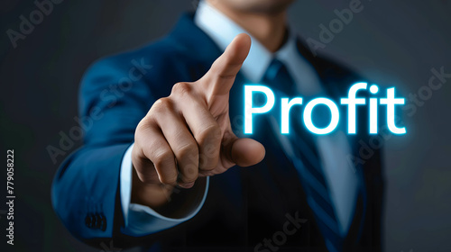 Businessman pointing in to word “Profit”, returns from investments and doing business