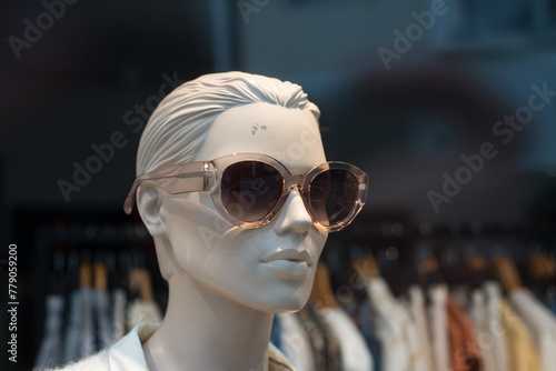 closeup of sun glasses on mannequin in a fashion store showroom © pixarno