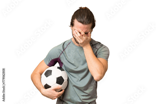 Young handsome football player man over isolated background with tired and sick expression