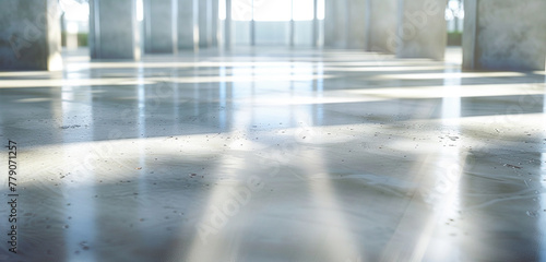 A sweeping view of a polished concrete floor  its surface smooth and reflective  casting soft shadows and highlights. 32k  full ultra HD  high resolution