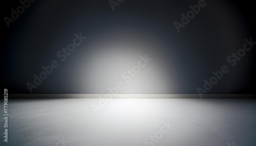 Suelo blanco y pared blanca con ilumincación de una fuente de luz puntual y sombras, degradado a negro photo