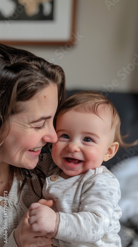 Smiling Mother with Laughing Baby, Candid Moment, Indoor Family Fun