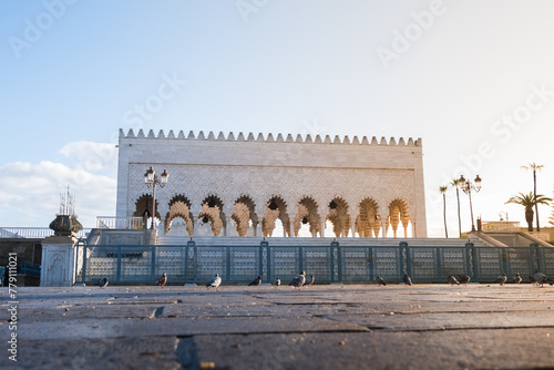 Sunrise at the Mausoleum of Mohammed V. It's a royal tomb located in Rabat, the capital of Morocco. The mausoleum houses the tomb of King Mohammed V, and his sons Hassan II and Mulay Abdella photo