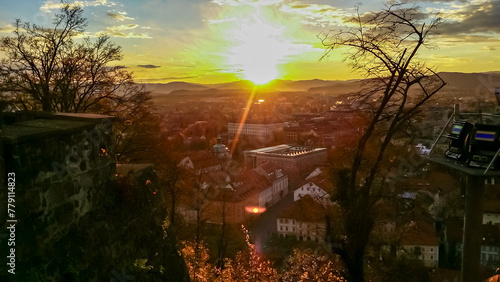 Breathtaking sunset aerial view of Ljubljana, Slovenia, Europe. Looking from renowned Ljubljana Castle, an architectural masterpiece. Snow capped mountain peaks of Karawanks and Julian Alps