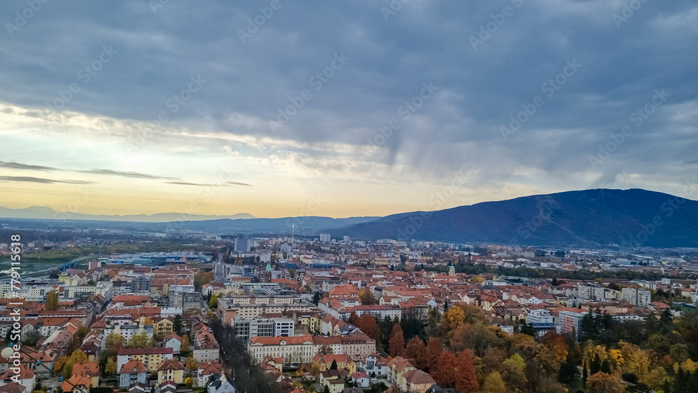 Majestic aerial view from Piramida (Pyramid Hill) offers breathtaking panorama of charming old town of Maribor, Slovenia, Europe. Stunning vantage point is gracefully enveloped by verdant vineyards
