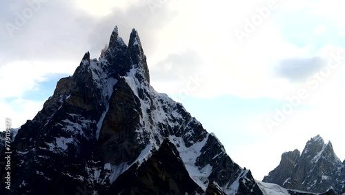 An up-close timelapse of Mount Sosbun Brakk (6413m), located in Karakoram National Park and at the brink of Biafo Glacier (67 Kilometers long). photo